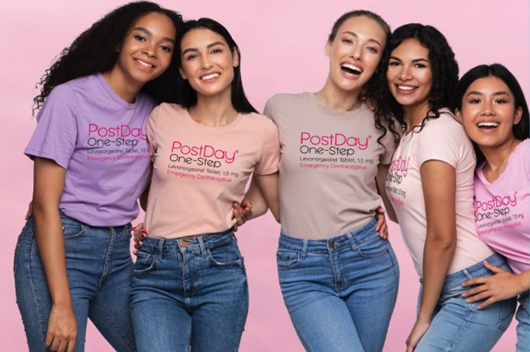 Five women wearing PostDay One-Step shirts